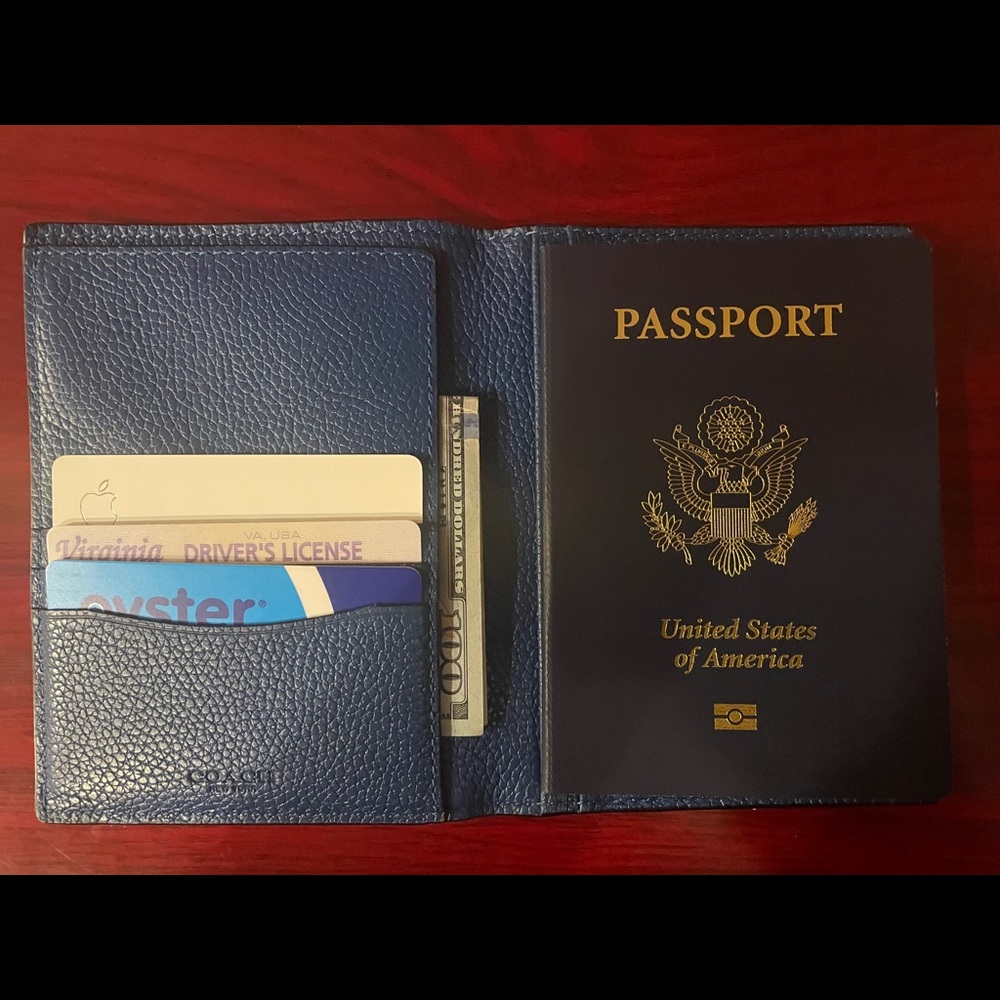 Coach blue passport wallet very lightly used